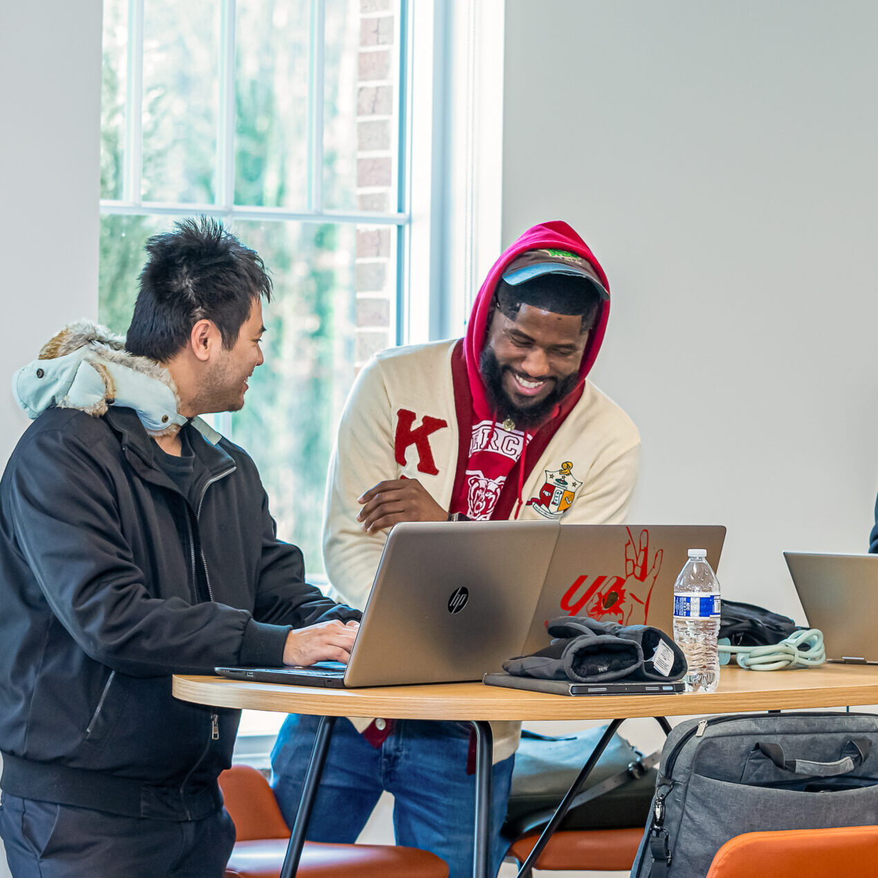 Two pharmacy students studying in the lounge